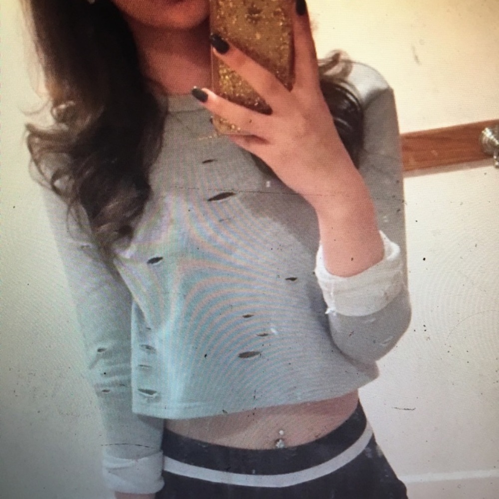 Super distressed cropped sweater